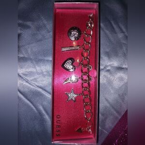 NWT and box matching GUESS bracelet and studs